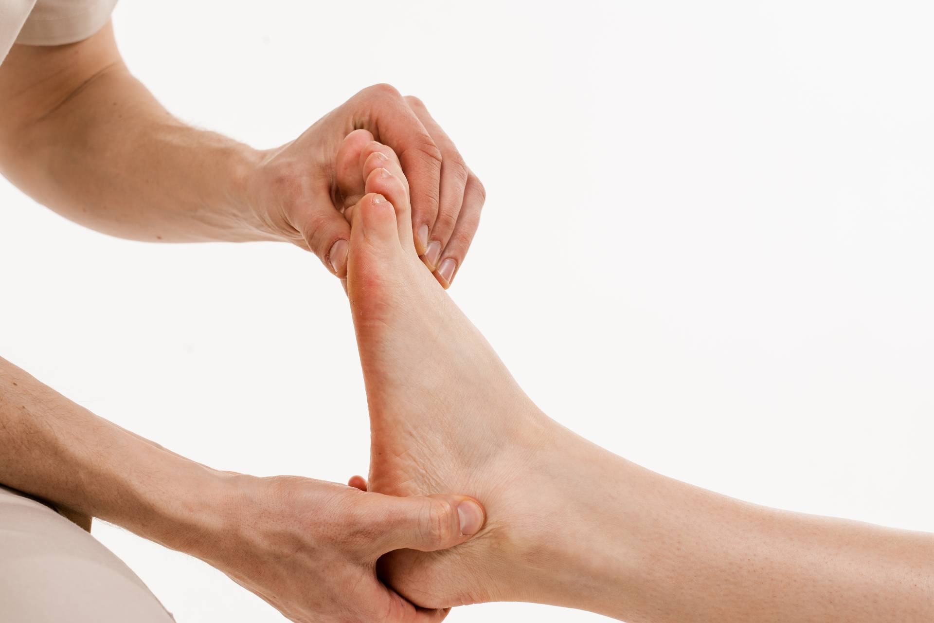 Close-up foot exam with orthopedic joint mobility testing